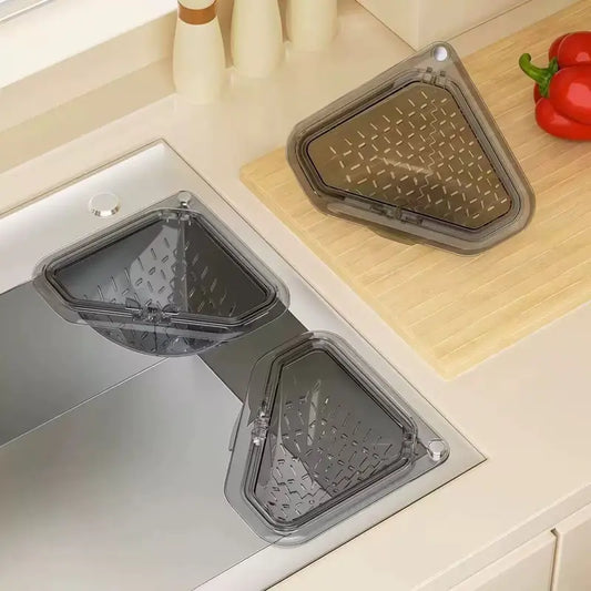 MCOIKY® Magnetic draining triangular kitchen sink filter for storing food scraps, leftovers, and kitchen waste.